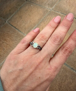 Nickel opal ring, size K.