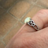 Nickel opal ring, size K.