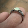 Nickel opal ring, size K.