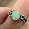 Nickel opal ring, size K.