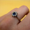 Silver ring with blue and clear cubic zirconia, size O.#119
