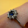 Silver ring with blue and clear cubic zirconia, size O.#119