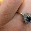 Silver ring with blue and clear cubic zirconia, size O.#119