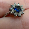 Silver ring with blue and clear cubic zirconia, size O.#119