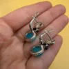 Unusual earrings. Sterling silver (925) with onyx and larimar.#152