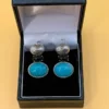 Unusual earrings. Sterling silver (925) with onyx and larimar.#152