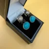 Unusual earrings. Sterling silver (925) with onyx and larimar.#152