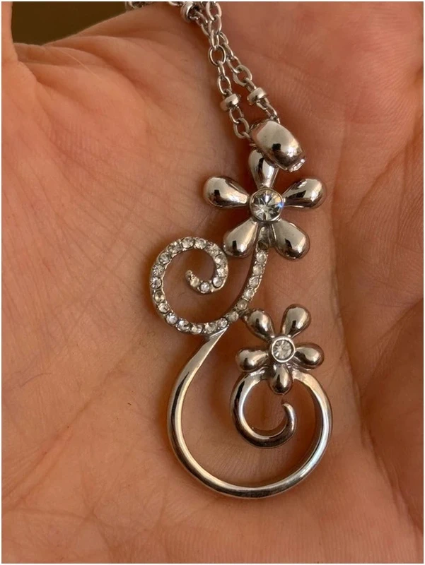 Silver-colored pendant with chain