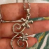 Silver-colored pendant with chain