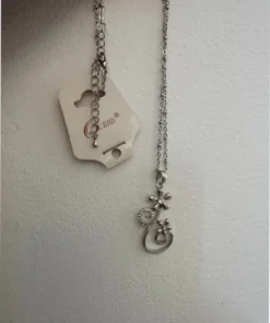 Silver-colored pendant with chain