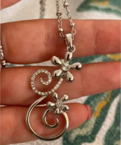 Silver-colored pendant with chain