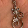 Silver-colored pendant with chain
