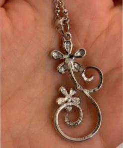 Silver-colored pendant with chain