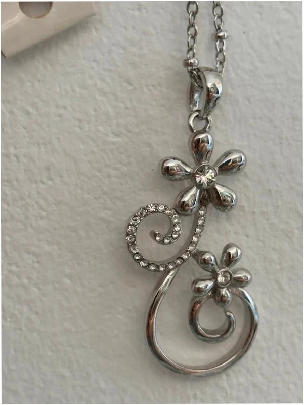 Silver-colored pendant with chain