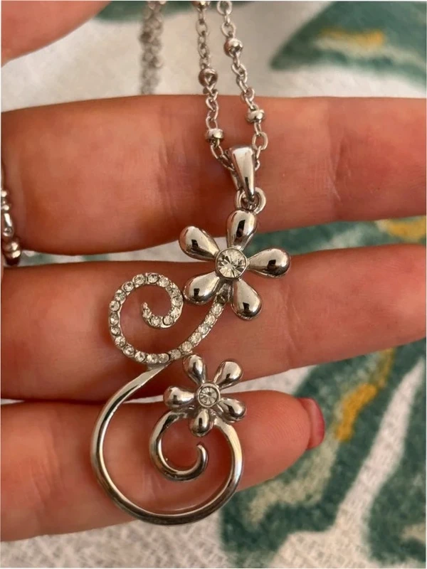 Silver-colored pendant with chain