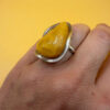 A very beautiful vintage sterling silver 925 ring with natural yellow amber. Size M adjustable