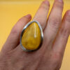 A very beautiful vintage sterling silver 925 ring with natural yellow amber. Size M adjustable