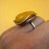 A very beautiful vintage sterling silver 925 ring with natural yellow amber. Size M adjustable