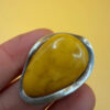 A very beautiful vintage sterling silver 925 ring with natural yellow amber. Size M adjustable