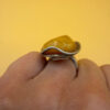 A very beautiful vintage sterling silver 925 ring with natural yellow amber. Size M adjustable