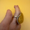 A very beautiful vintage sterling silver 925 ring with natural yellow amber. Size M adjustable
