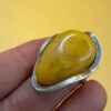 A very beautiful vintage sterling silver 925 ring with natural yellow amber. Size M adjustable