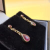 375 gold ( 9 k) JAH hallmark earrings with natural ruby~108