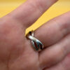 sterling silver wave ring features a distinctive intertwined design Uk size M