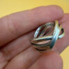sterling silver wave ring features a distinctive intertwined design Uk size M
