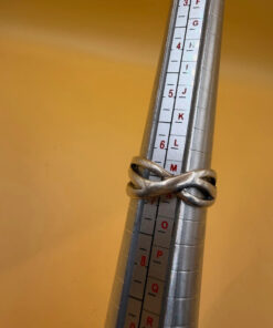 sterling silver wave ring features a distinctive intertwined design Uk size M