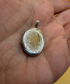 Germany vintage sterling silver oval locket features detailed engraved floral motifs~108