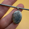 Germany vintage sterling silver oval locket features detailed engraved floral motifs~108