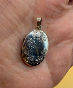 Germany vintage sterling silver oval locket features detailed engraved floral motifs~108