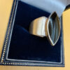 Stunning sterling silver signet ring featuring a natural onyx, size 0