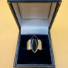 Stunning sterling silver signet ring featuring a natural onyx, size 0