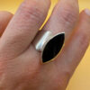 Stunning sterling silver signet ring featuring a natural onyx, size 0