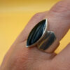 Stunning sterling silver signet ring featuring a natural onyx, size 0
