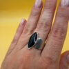 Stunning sterling silver signet ring featuring a natural onyx, size 0