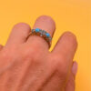 A silver ring, size P, with natural topaz and turquoise stones