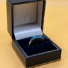 A silver ring, size P, with natural topaz and turquoise stones