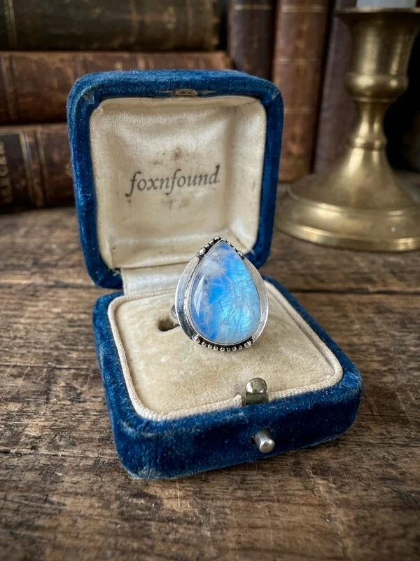 An incredible natural moonstone set in a sterling silver ring, UK size N½.