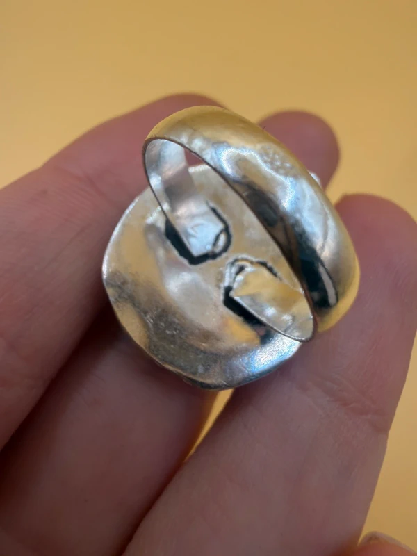An incredible natural moonstone set in a sterling silver ring, UK size N½.