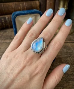 An incredible natural moonstone set in a sterling silver ring, UK size N½.