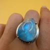 An incredible natural moonstone set in a sterling silver ring, UK size N½.