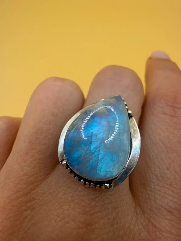 An incredible natural moonstone set in a sterling silver ring, UK size N½.