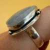 An incredible natural moonstone set in a sterling silver ring, UK size N½.