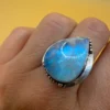 An incredible natural moonstone set in a sterling silver ring, UK size N½.