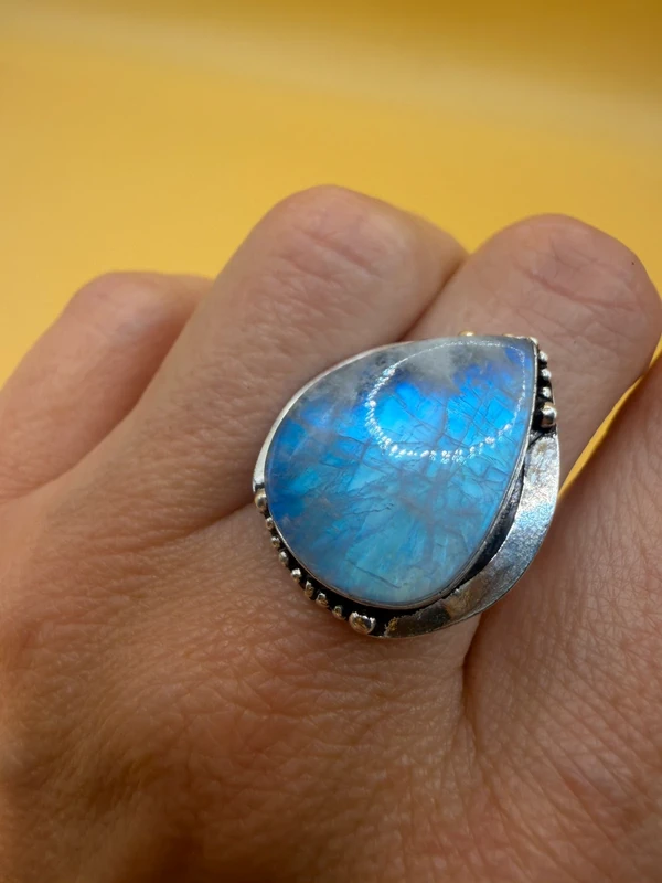 An incredible natural moonstone set in a sterling silver ring, UK size N½.