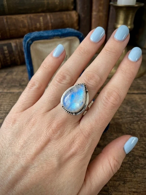 An incredible natural moonstone set in a sterling silver ring, UK size N½.