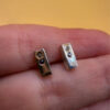 Sterling silver stud earrings with diamond and ruby~38